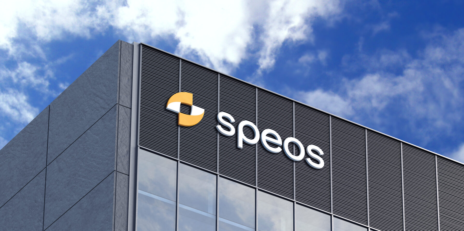 L'enseigne Speos sur le building de l'entreprise, logo réalisé par Atelier Design, agence de communication sur Bruxelles